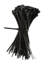Bunch of black cable ties on a white background
