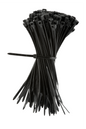 Bunch of black cable ties on a white background